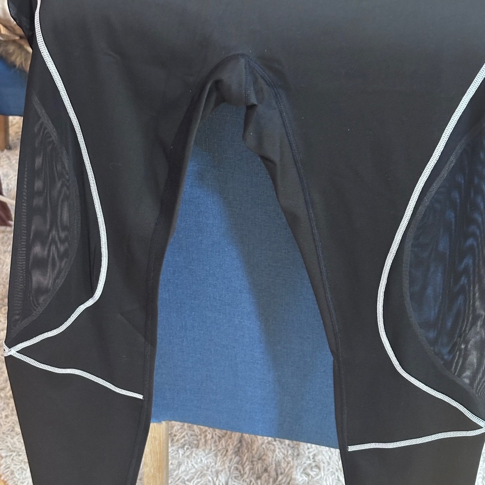 SO  Brand   black leggings with white piping and sheer mesh down the side of leg